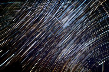 Abstract blur of Light trals star orbit on sky, for background