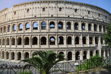 Rome, Italy - June 2019 -  Colosseum in Rome. Colosseum is the most landmark in Rome. Huge Roman amphitheatre.