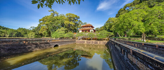Fototapeta premium Minh Mang tomb near the Imperial City with the Purple Forbidden City within the Citadel in Hue, Vietnam. Imperial Royal Palace of Nguyen dynasty in Hue. Hue is a popular 