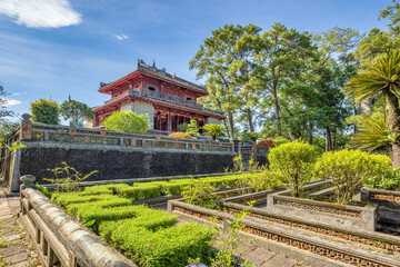 Fototapeta na wymiar Minh Mang tomb near the Imperial City with the Purple Forbidden City within the Citadel in Hue, Vietnam. Imperial Royal Palace of Nguyen dynasty in Hue. Hue is a popular 