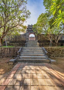 Minh Mang tomb near the Imperial City with the Purple Forbidden City within the Citadel in Hue, Vietnam. Imperial Royal Palace of Nguyen dynasty in Hue. Hue is a popular 