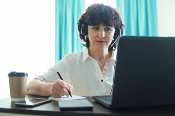 Senior woman working online