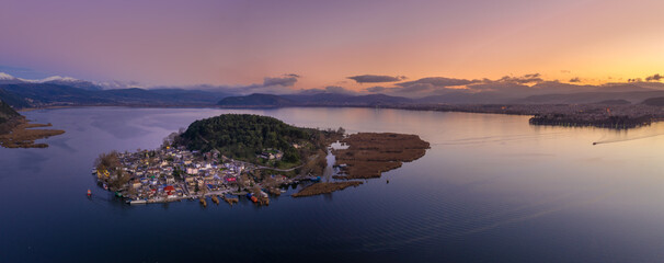 Naklejka premium Aerial view of Ioannina city in Greece, Aslan Pasha Tzami, the lake with the island of Kyra Frosini or nissaki.