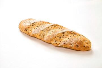 White sandwich baguette bread with seasonings and seeds