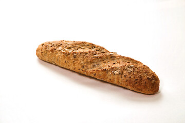 Brown sandwich baguette bread with seasonings and seeds