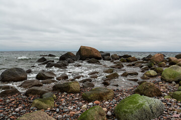 Fototapeta na wymiar A rocky beach on the shores of the Baltic Sea