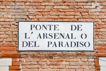 signage Ponte de l'Arsenale o del Paradiso(engl: area of the Arsenal or the paradise  area) in Venice, Italy,  the shipyard area in Venice