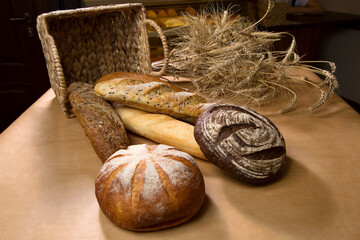 Bread different types white bread black bread still life basket with spikelets of wheat