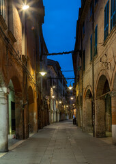 FERRARA, ITALY - NOVEMBER 9, 2021: The street San Romano of old town at dusk.
