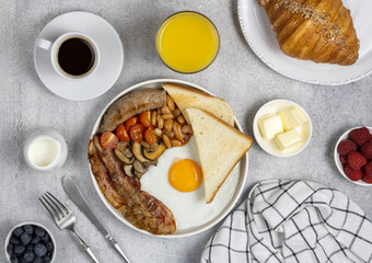 Traditional full english breakfast on a wooden background