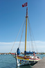 Traditional sailing vessel Falcao Veloz in the harbour of Lagos in the Algarve