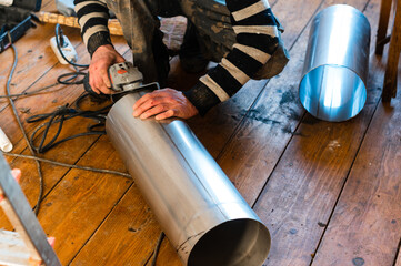 Installation of a pipe for a flue from stainless steel, a pipe with a diameter of two hundred...