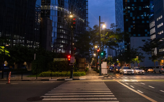 Urban city traffic at night. Bonifacio Global City (BGC), Philippines