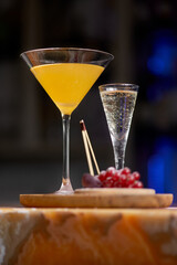 Daiquiri cocktail with rum and lime juice on the bar in a pub or restaurant. Traditional taste.