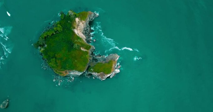 Aerial Tilt Up Shot Of Green Natural Rock Formations, Drone Panning Over Sea - Ruby Beach, Washington