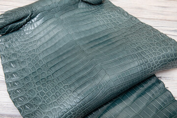 blue aquamarine dyed alligator natural leather - material for handbags and shoes