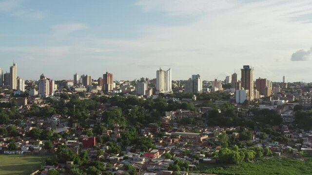 Aerial view Asuncion Paraguay. Cityscape of the capital with skyline by the river and the historic city center.