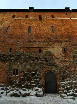 Middle age, 1200 to 1300 style castle wall brick wall fortifications during winter. Hämeen linna, castle of Häme, in Finland  