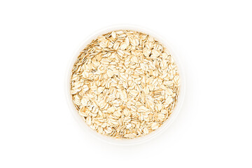 Rolled oat in bowl isolated on white background        