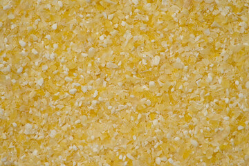 Corn flour background or texture. Macro, top view        