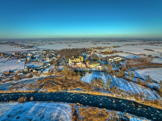  Abbey in Lad, Poland Wielkopolska, polish church during the sunset in winter time from above, drone photo 