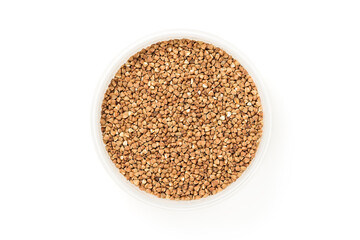 Buckwheat in bowl isolated on white background     
