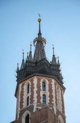 Fototapeta na wymiar Church tower at Krakow old city center