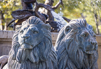 Fototapeta na wymiar Lion statue at La Rotonde Fontaine, Aix-en-Provence, France