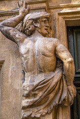 Statue by a doorway in Aix-en-Provence, France