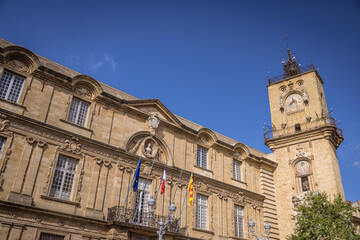 Fototapeta na wymiar Town hall and clock tower in Aix-en-Provence, France