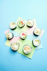 sushi rolls on a color background, minimalism