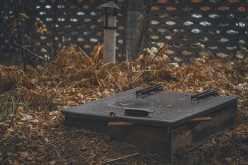 Cellar hatch in the ground. Place of storage of vegetables and stocks for the winter. Emergency...