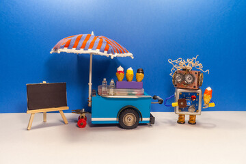 Mobile ice cream cart and robot seller. A funny smiling robotics shopman with ice cream cone. Empty...