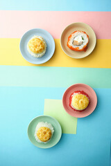 sushi rolls on a color background, minimalism