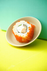 sushi rolls on a color background, minimalism