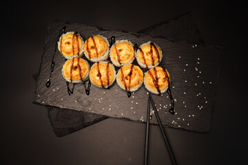 sushi rolls on a color background, minimalism