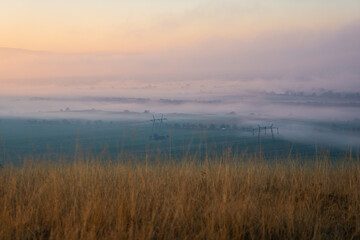 Autumn morning fog landscape