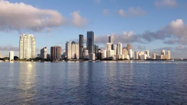 Time lapse of City of Miami, Florida skyline at sunrise on calm winter morning 4K.
