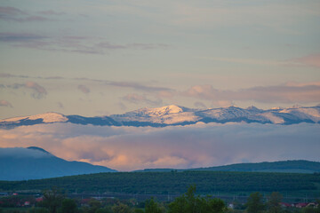 cover with snow mountains in the morning