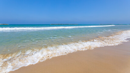 Fototapeta na wymiar Sea and sandy beach in Tel Aviv