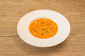 Gazpacho is a cold soup with various ingredients such as olive oil, vinegar, water, raw vegetables, usually cucumbers, peppers, onions and garlic