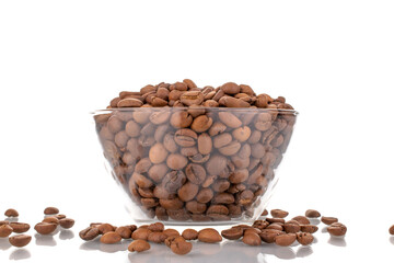 Several fragrant freshly roasted coffee beans in glassware, close-up, isolated on white.