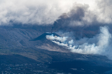 Active volcano of La Palma emitting ashes and steam