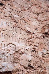 Medieval stone script and carvings on the exterior of Frauenkirche in Munich