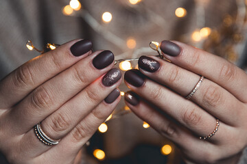 manicure nail art design for new year, christmas cat eye effect black purple golden chameleon - 479220013