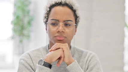 Fototapeta na wymiar Close up of Pensive African Woman Thinking