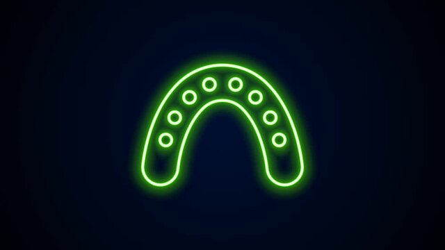 Glowing neon line Mouth guard boxer icon isolated on black background. 4K Video motion graphic animation