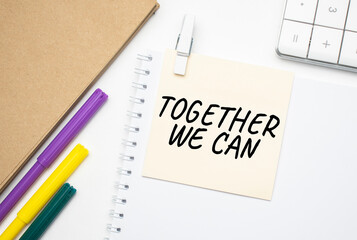 Together We Can Notebook on laptop keyboard, on light background