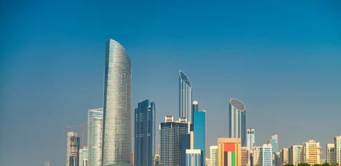 Gordijnen Abu Dhabi skyline and skyscrapers on a sunny day, UAE. © jovannig