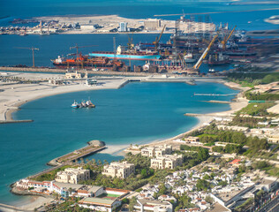 DUBAI, UAE - DECEMBER 10, 2016: Helicopter viewpoint on Dubai beach and port.